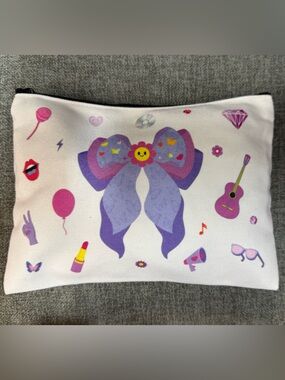 Purple Bow Graphic Organizer Zipper Pouch. NWOT (Material type; Canvas)